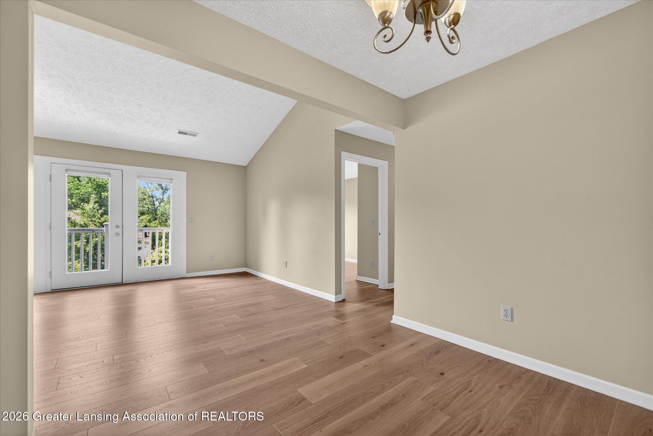 1337 Coolidge Road, Unit 16 East Lansing, MI 48823 - Photo 7 of 31 07-1337-Coolidge-Rd-WindowStill