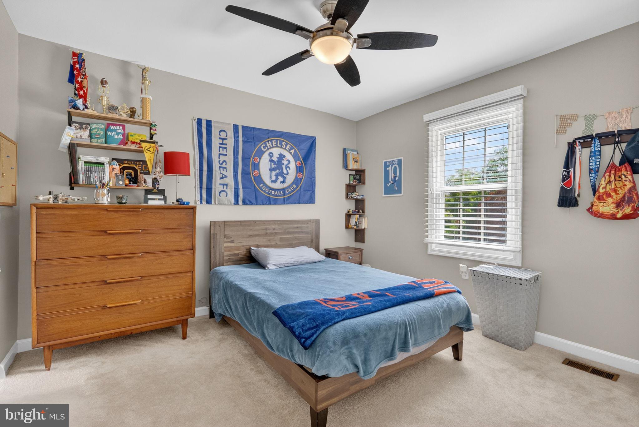 2935 Miller Heights Road Oakton, VA 22124 - Photo 28 of 56 Charming bedroom with sports flair.