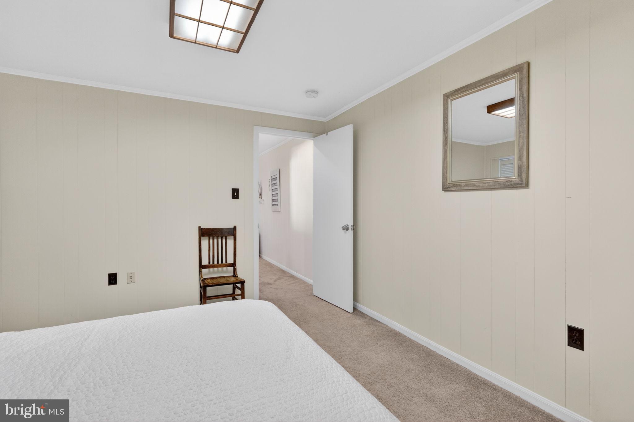 2935 Miller Heights Road Oakton, VA 22124 - Photo 41 of 56 Cozy bedroom with inviting simplicity.