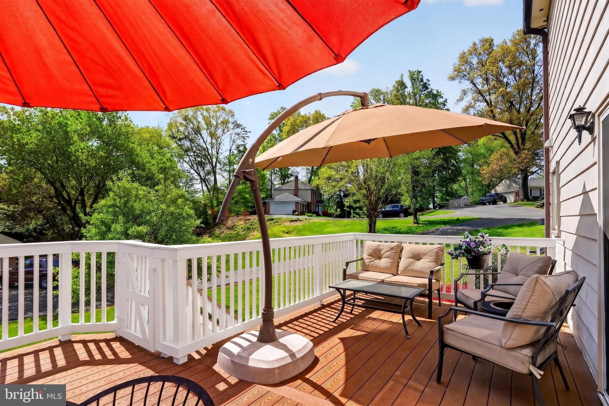 2935 Miller Heights Road Oakton, VA 22124 - Photo 42 of 56 Sunny deck with vibrant umbrellas.