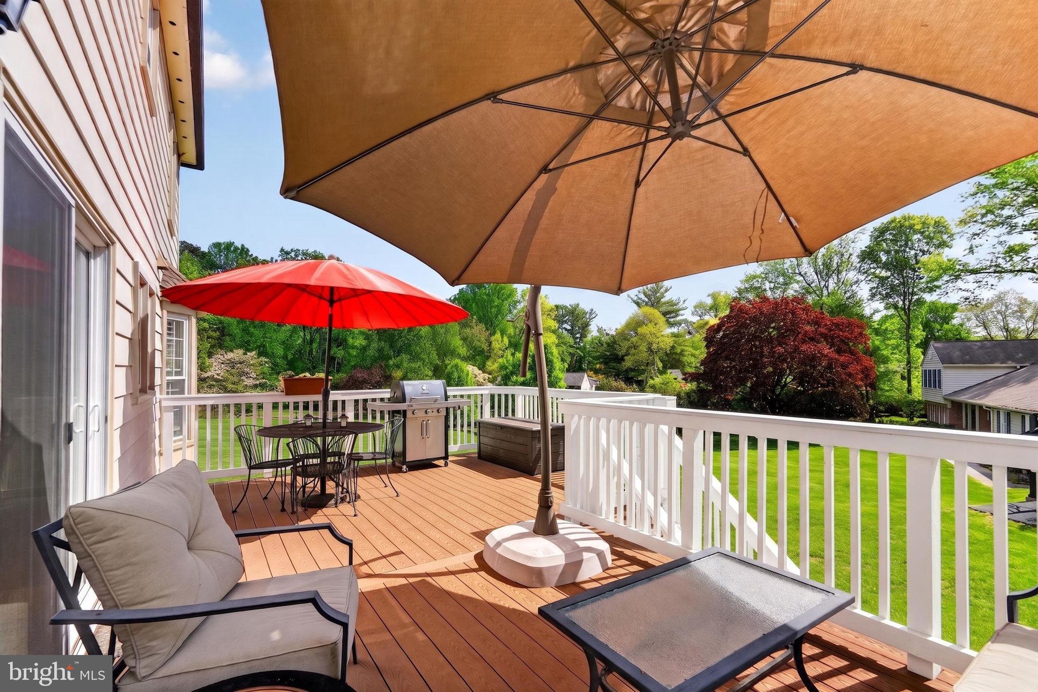 2935 Miller Heights Road Oakton, VA 22124 - Photo 43 of 56 Sunny deck with vibrant umbrellas.