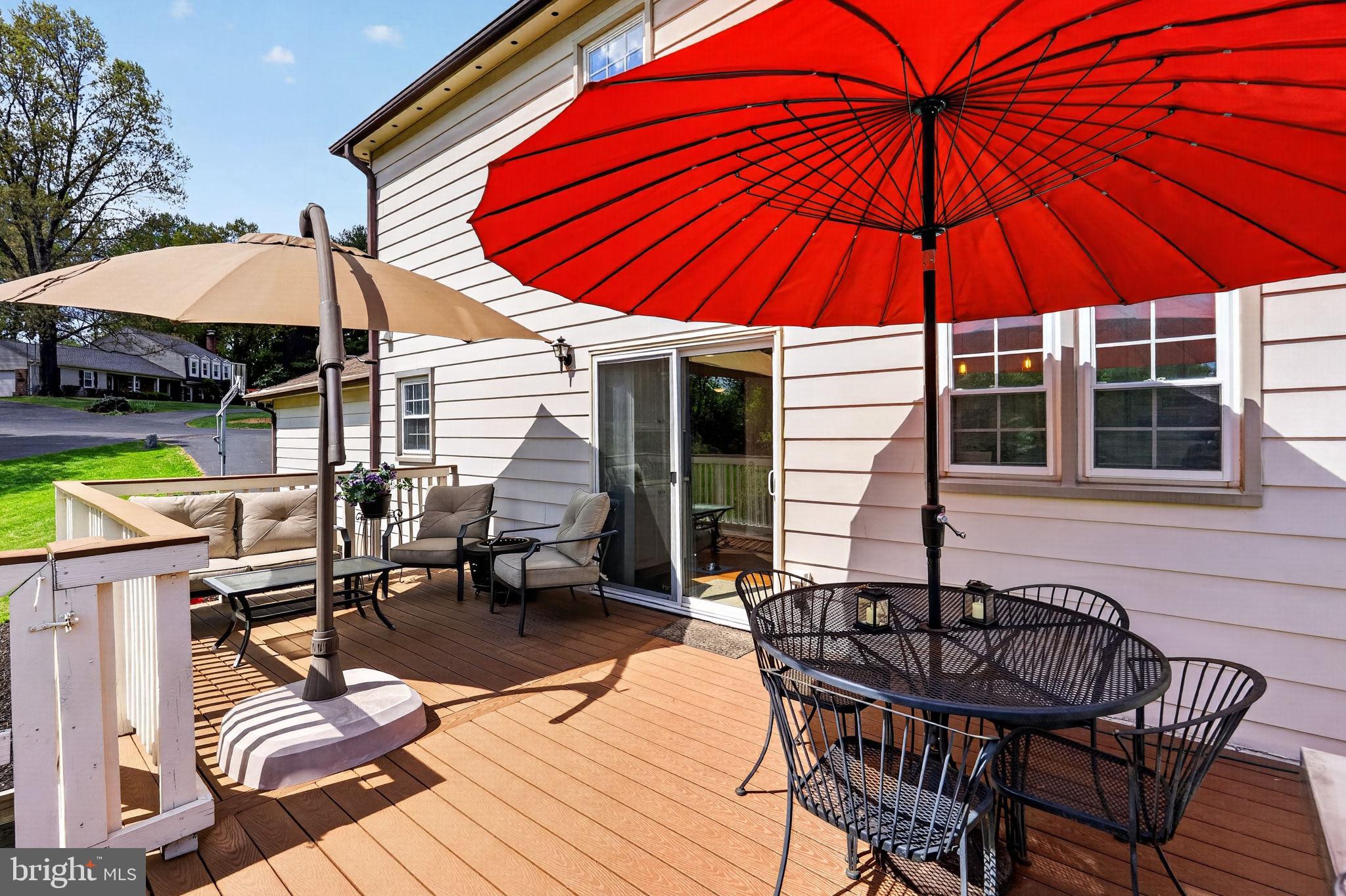 2935 Miller Heights Road Oakton, VA 22124 - Photo 45 of 56 Sunny deck with vibrant umbrellas.