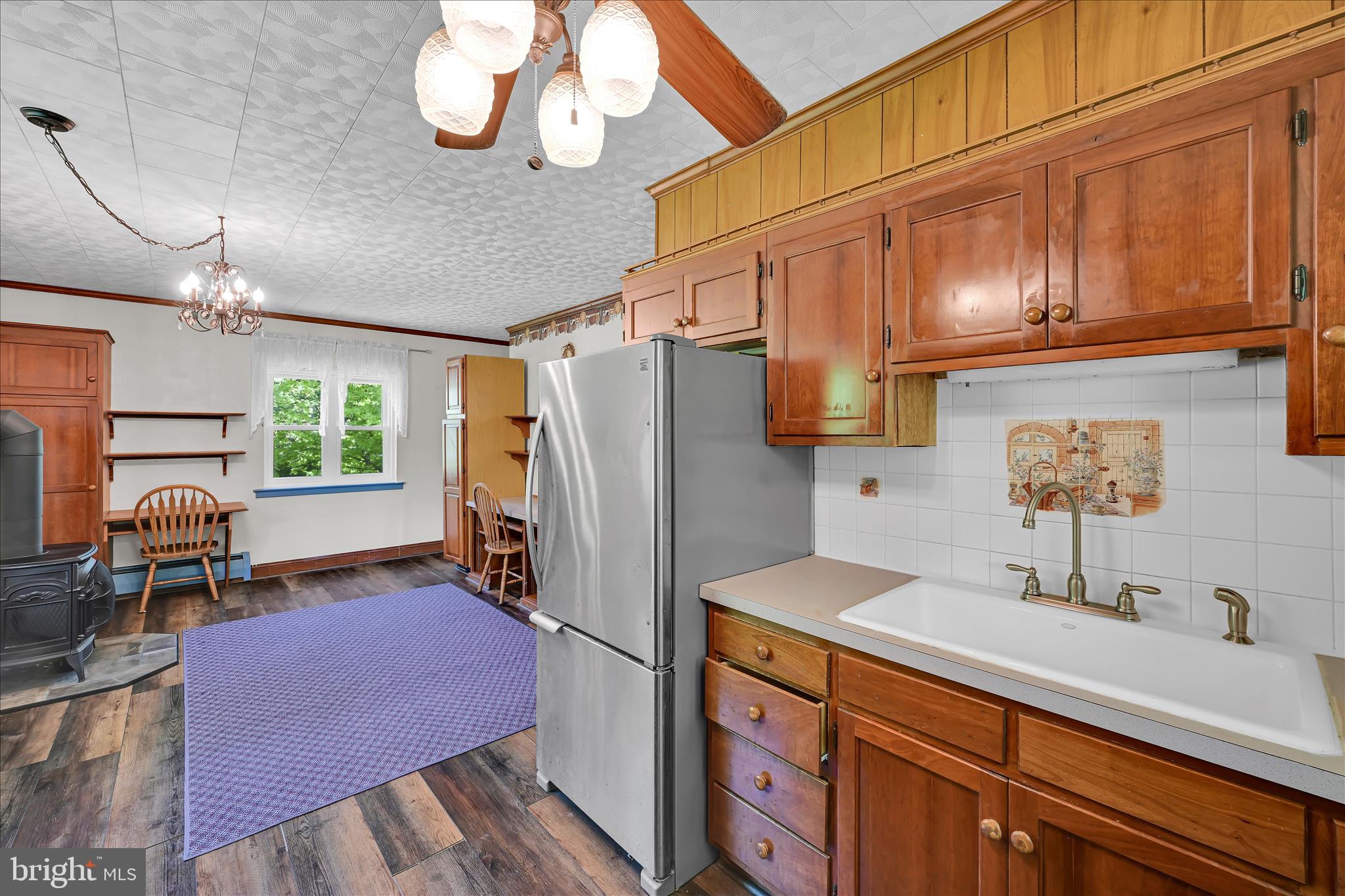 147 Walnut Street Mohnton, PA 19540 - Photo 13 of 46 a kitchen with a refrigerator and a sink
