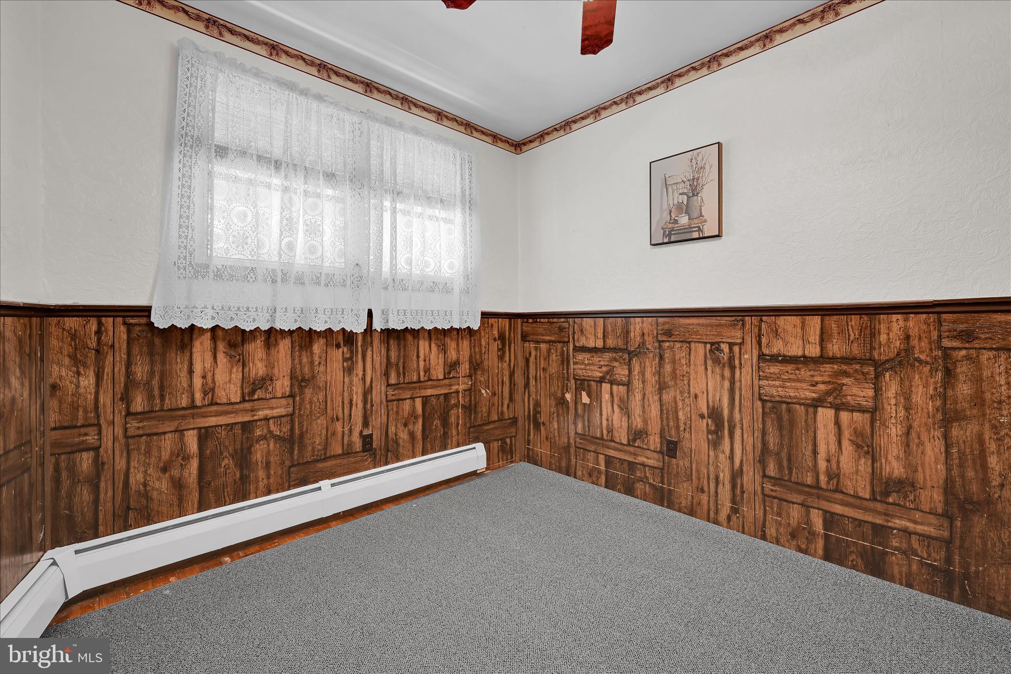 147 Walnut Street Mohnton, PA 19540 - Photo 21 of 46 a view of a hallway with wooden stairs