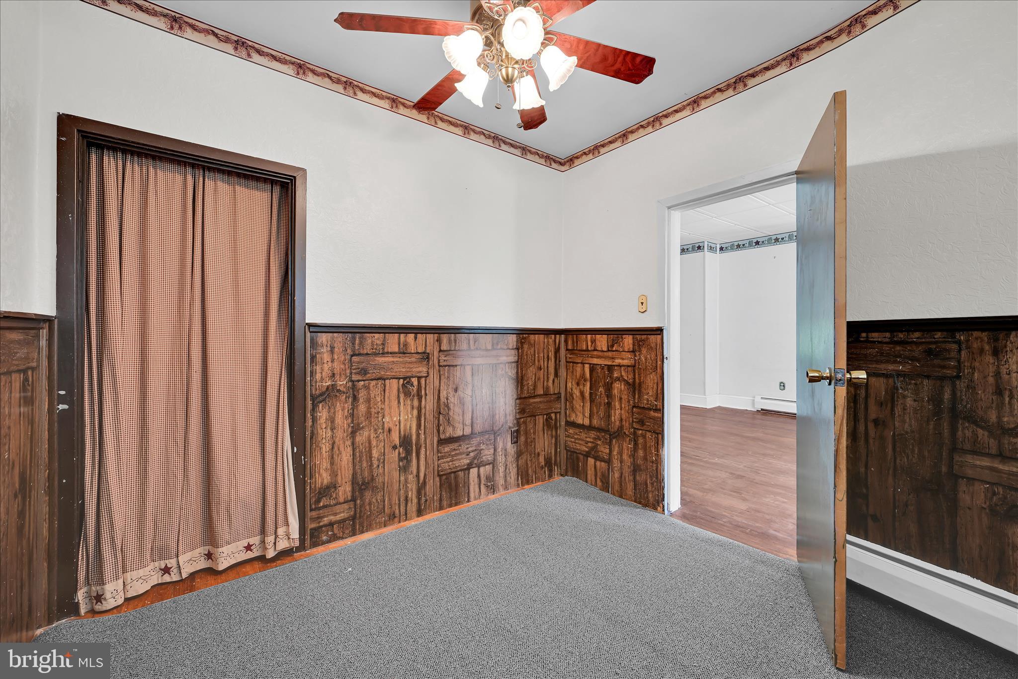 147 Walnut Street Mohnton, PA 19540 - Photo 22 of 46 a view of a hallway with wooden floor and staircase