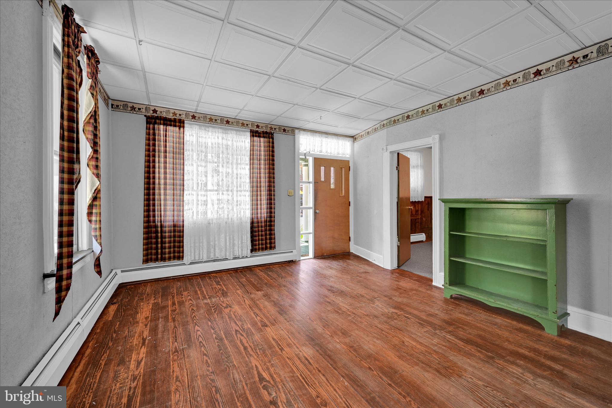 147 Walnut Street Mohnton, PA 19540 - Photo 24 of 46 a view of empty room with wooden floor and fan