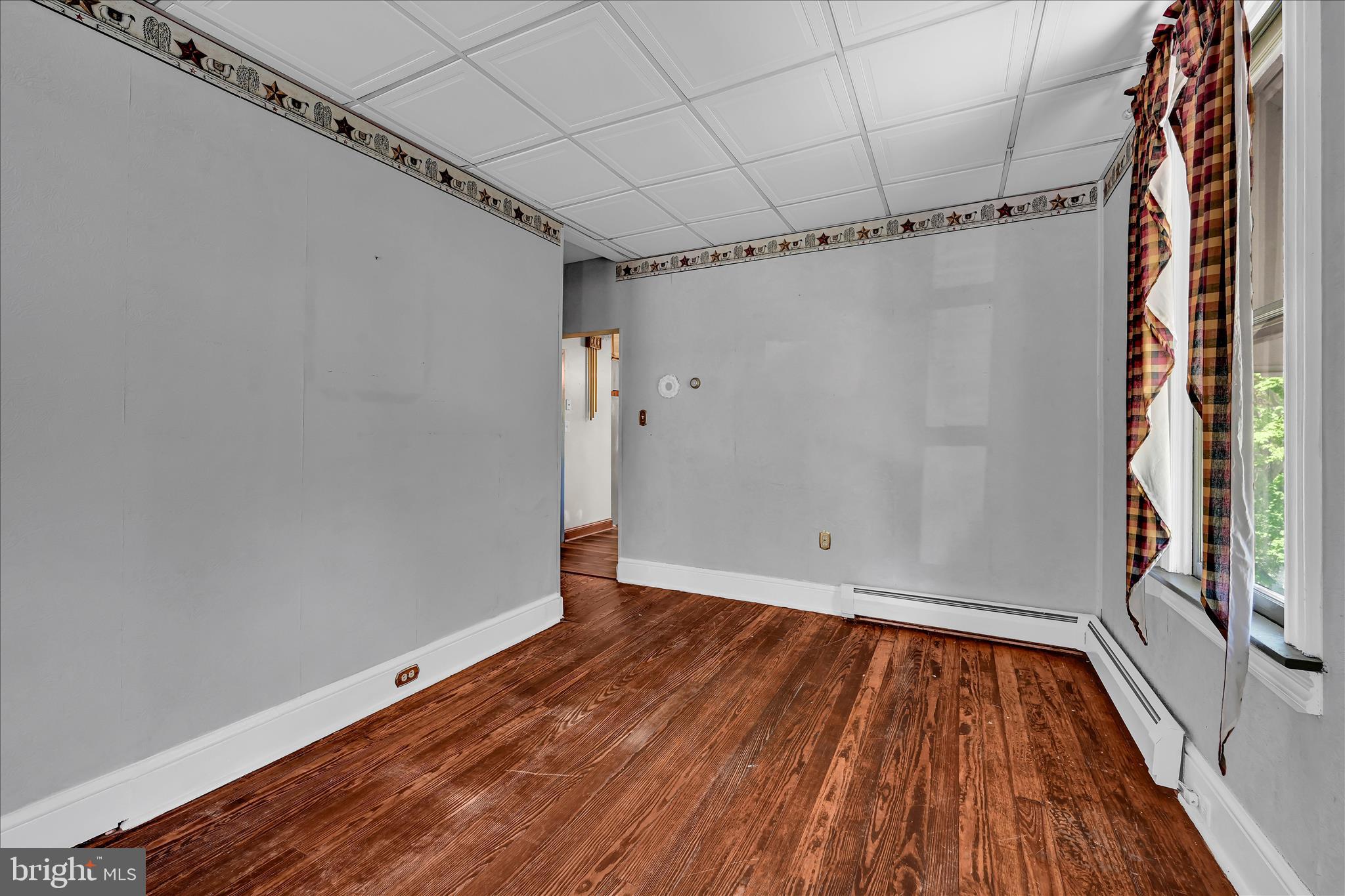 147 Walnut Street Mohnton, PA 19540 - Photo 25 of 46 a view of a room with wooden floor and brick walls