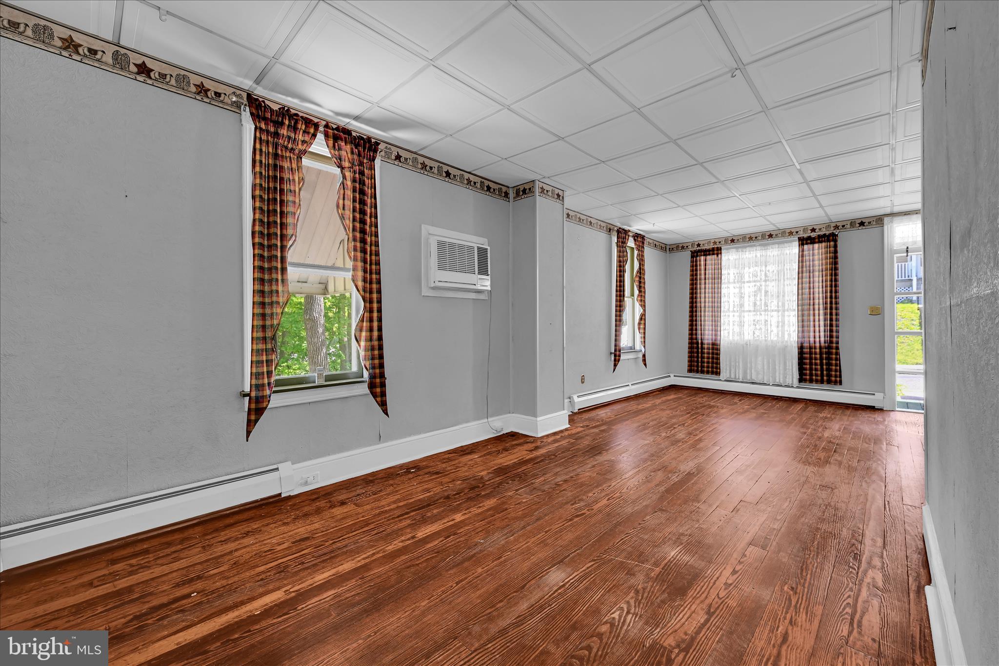 147 Walnut Street Mohnton, PA 19540 - Photo 26 of 46 a view of empty room with wooden floor and fan