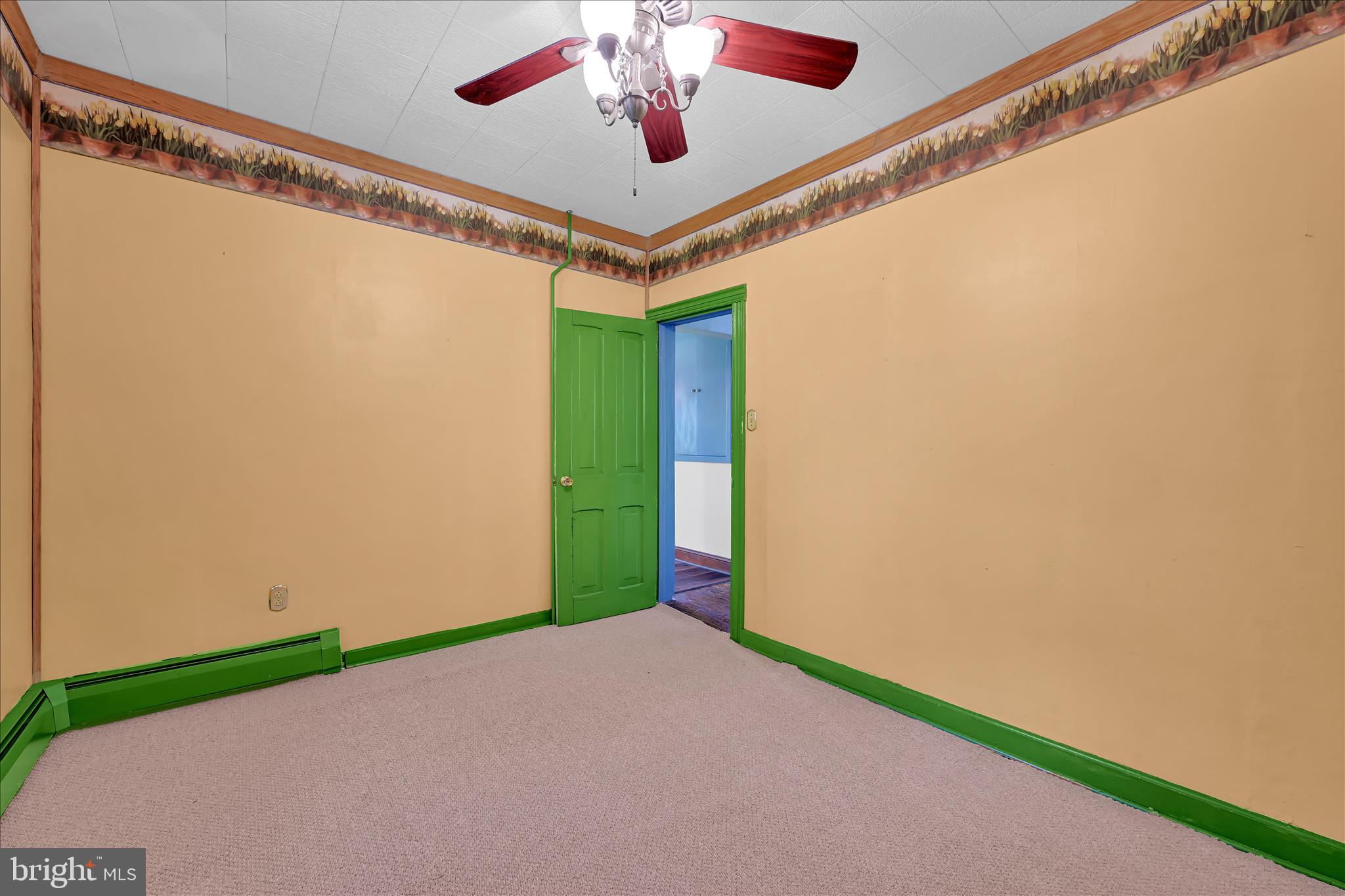 147 Walnut Street Mohnton, PA 19540 - Photo 32 of 46 a view of a big room with wooden floor and windows in a room