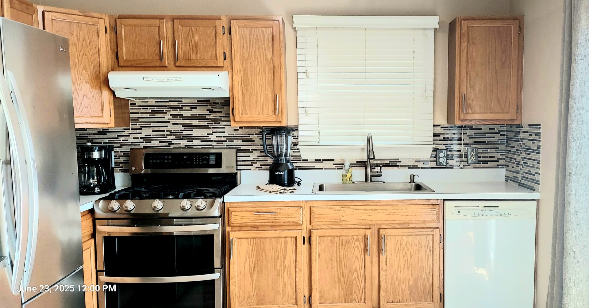 100 Hamlet Circle Montgomery, IL 60538 - Photo 13 of 42 a kitchen with a stove and a sink