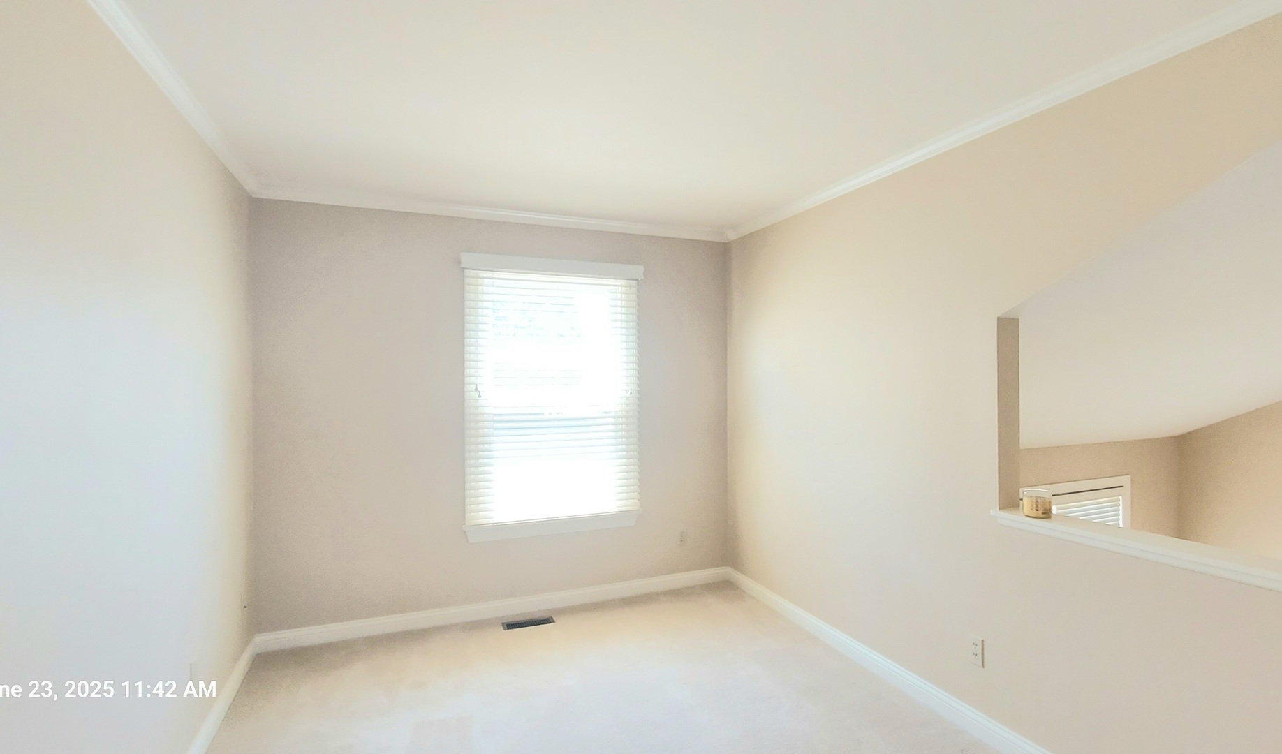 100 Hamlet Circle Montgomery, IL 60538 - Photo 25 of 42 a view of an empty room with a window