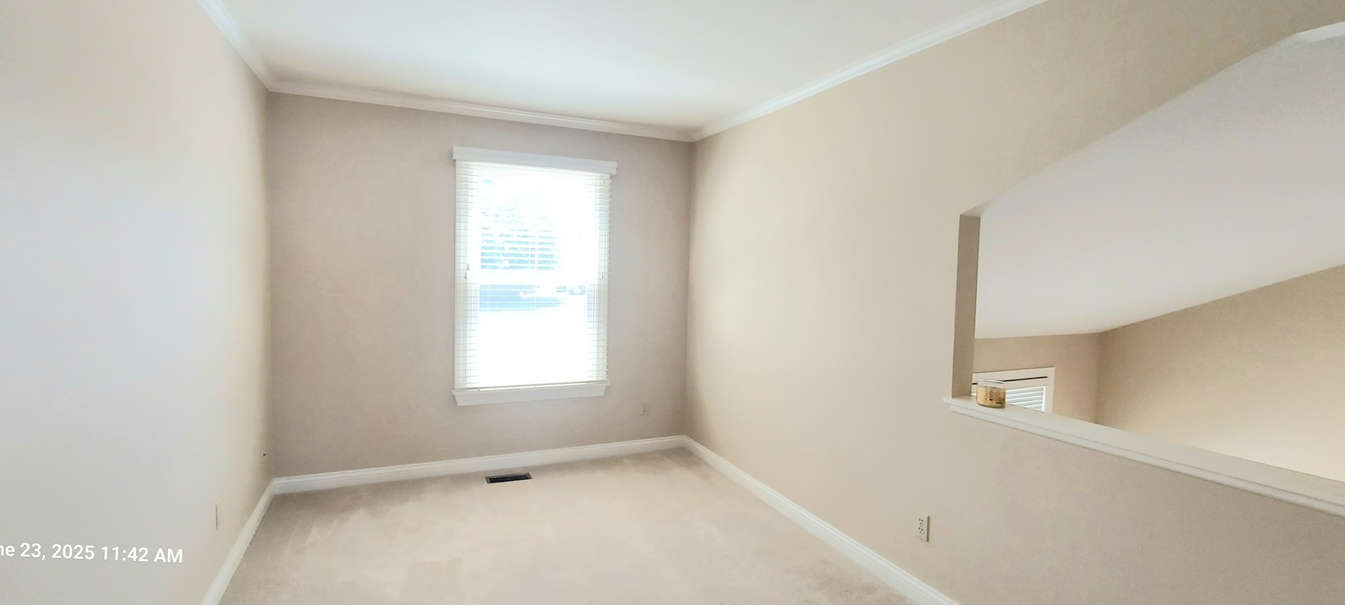 100 Hamlet Circle Montgomery, IL 60538 - Photo 27 of 42 a view of an empty room with a window