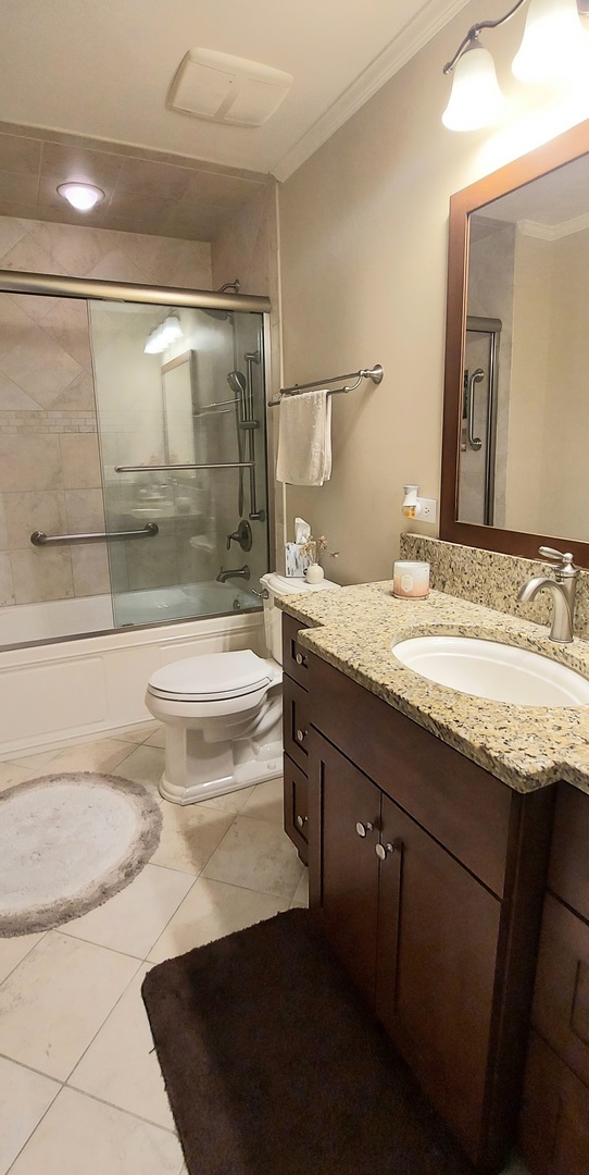 100 Hamlet Circle Montgomery, IL 60538 - Photo 39 of 42 a bathroom with a granite countertop sink toilet and shower