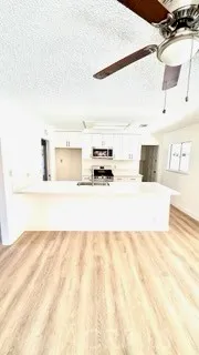 a view of a living room with a bed