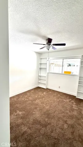 a view of a room with an empty space