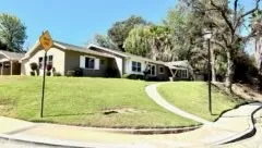 a view of a house with swimming pool