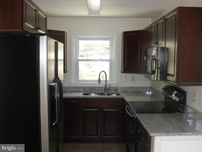 734 West Ring Factory Road Bel Air, MD 21015 - Photo 3 of 10 Kitchen with granite countertops.