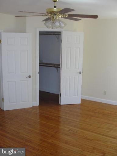 734 West Ring Factory Road Bel Air, MD 21015 - Photo 4 of 10 Main level bedroom with walk in closet