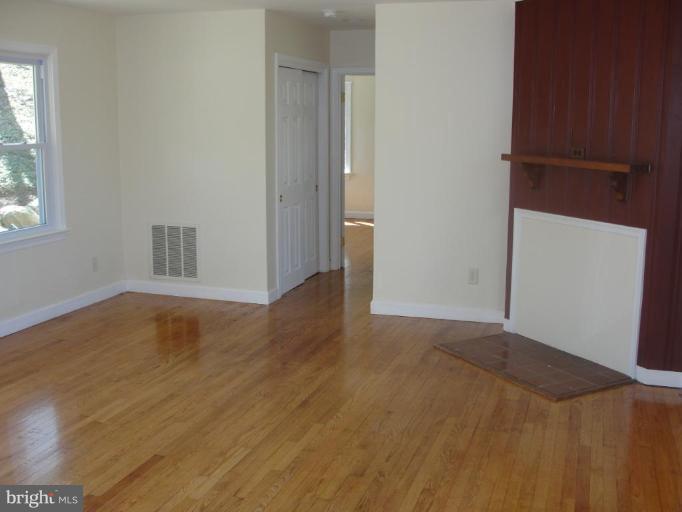 734 West Ring Factory Road Bel Air, MD 21015 - Photo 6 of 10 Living Room - fireplace, hardwood floor