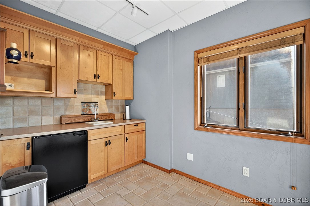177 Ridgewood Drive Lake Ozark, MO 65049 - Photo 29 of 49 Kitchenette & Lower Level Walk-Out