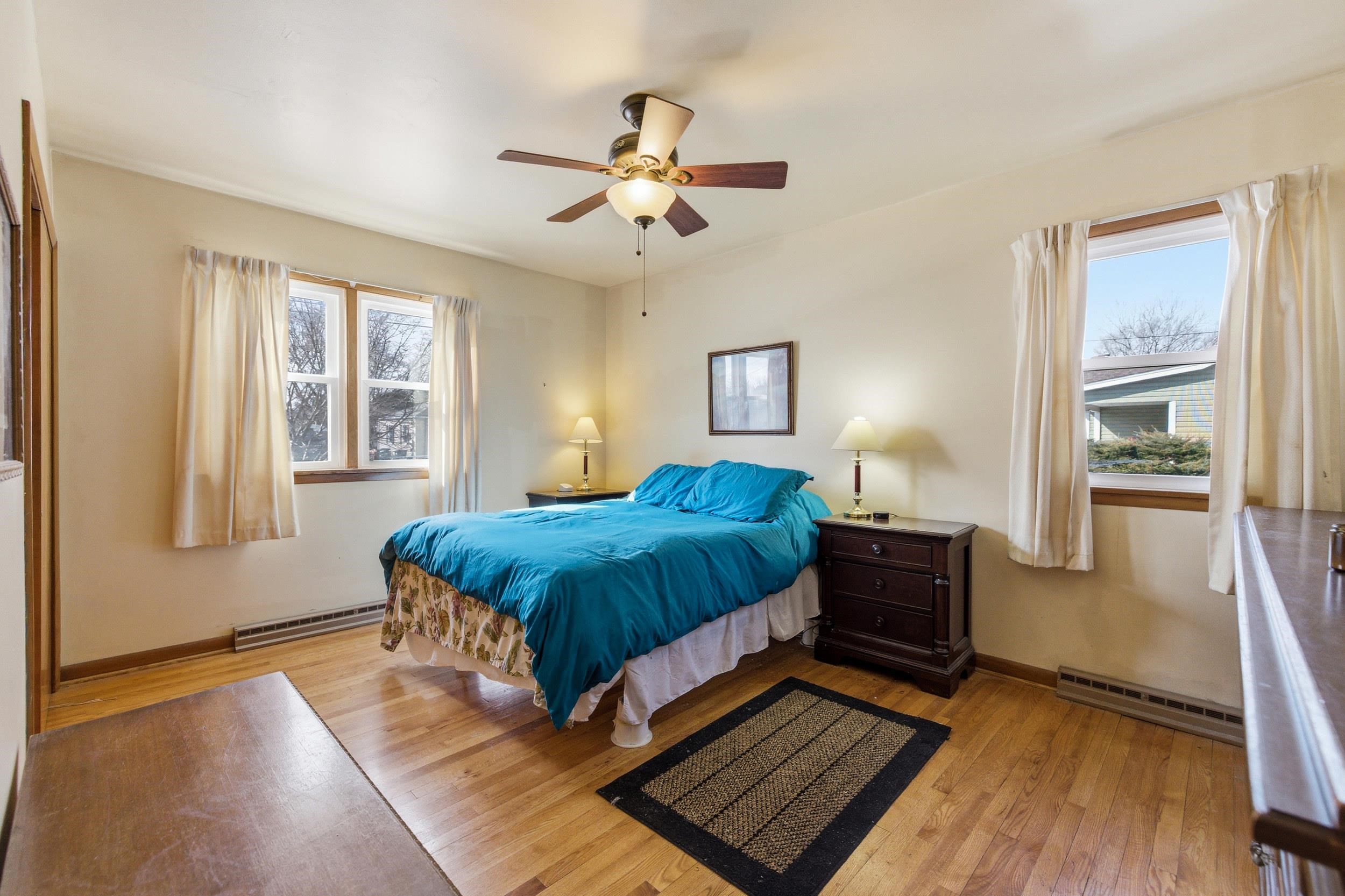 405 North River Road Bridgewater, VA 22812 - Photo 16 of 55 a spacious bedroom with a bed and wooden floor