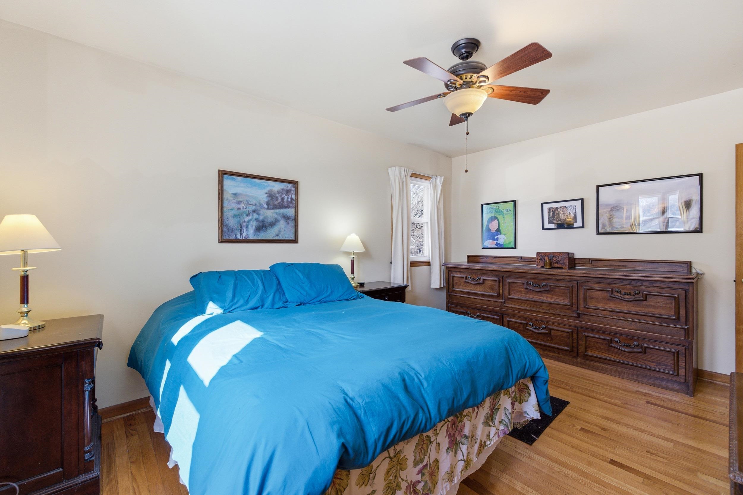 405 North River Road Bridgewater, VA 22812 - Photo 17 of 55 a bed room with a bed and a ceiling fan