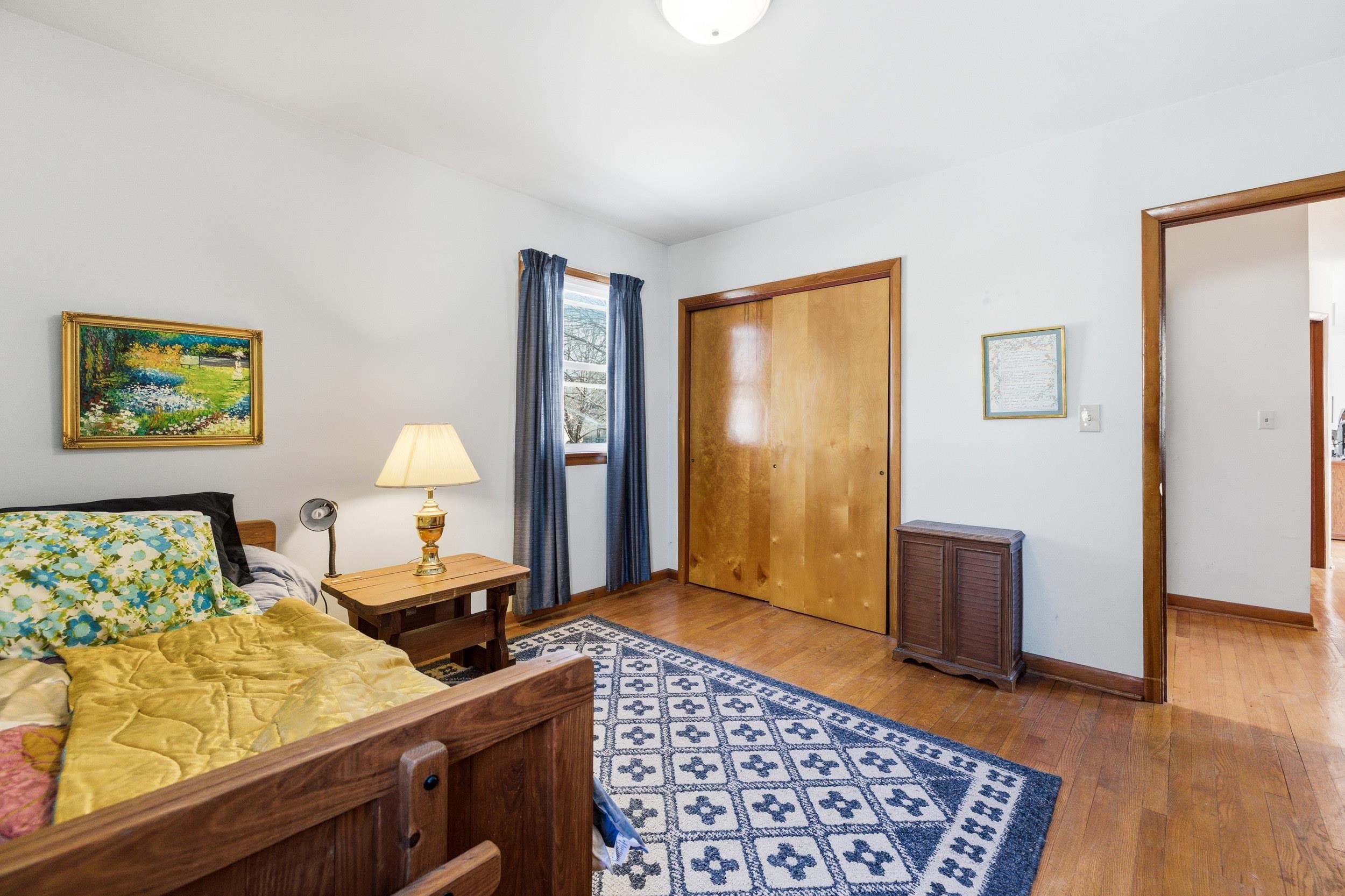 405 North River Road Bridgewater, VA 22812 - Photo 21 of 55 a bedroom with a bed and wooden floor