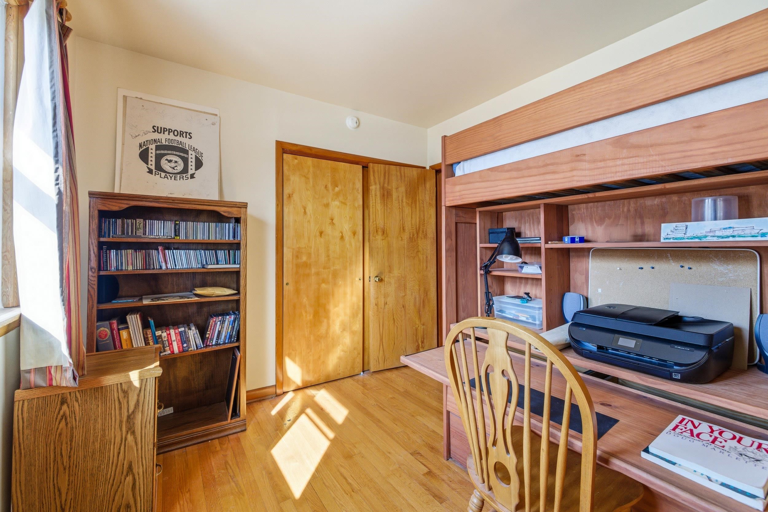 405 North River Road Bridgewater, VA 22812 - Photo 23 of 55 a bedroom with a bed and a book shelf