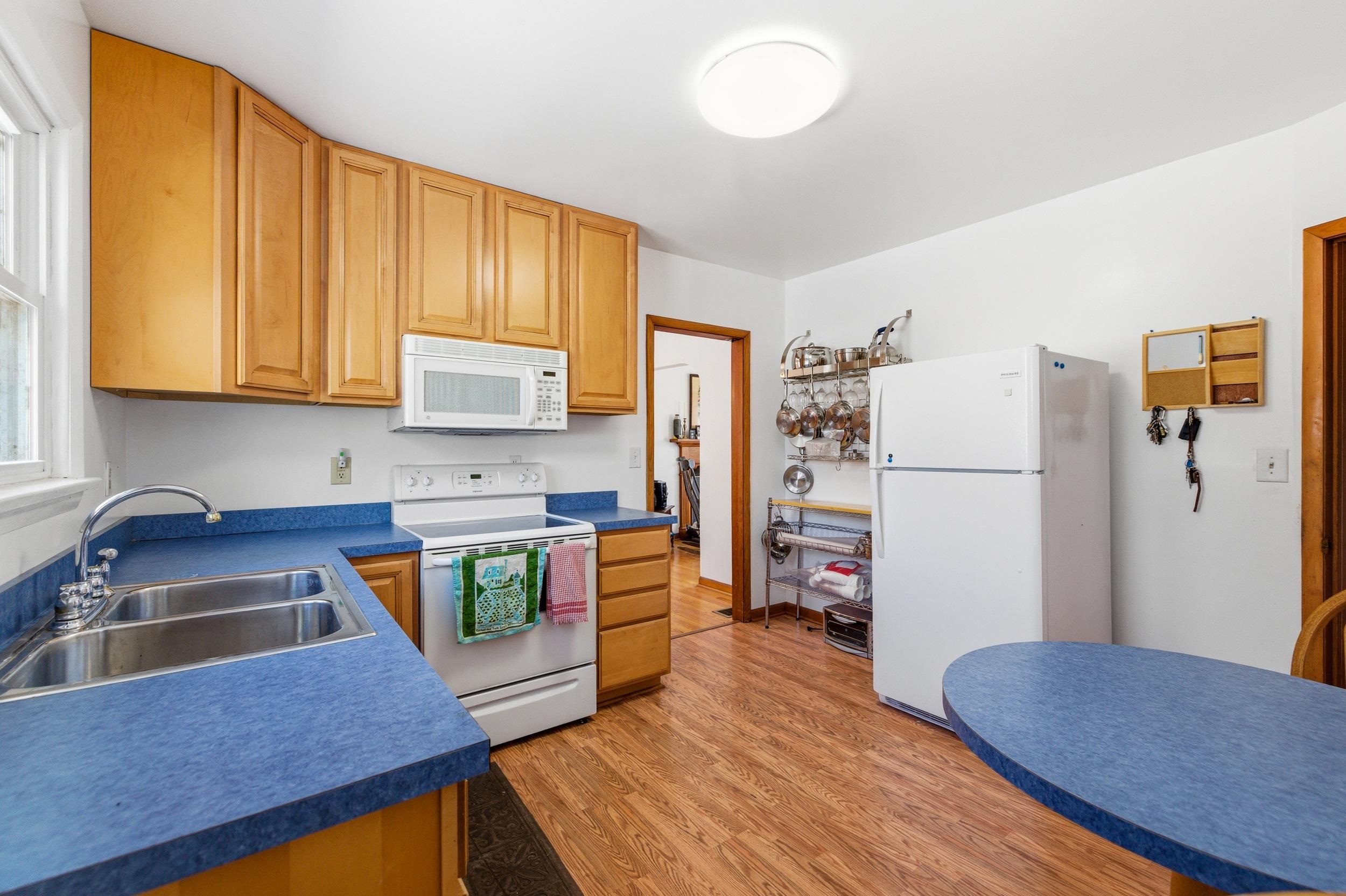 405 North River Road Bridgewater, VA 22812 - Photo 4 of 55 a kitchen with stainless steel appliances granite countertop a refrigerator sink and stove