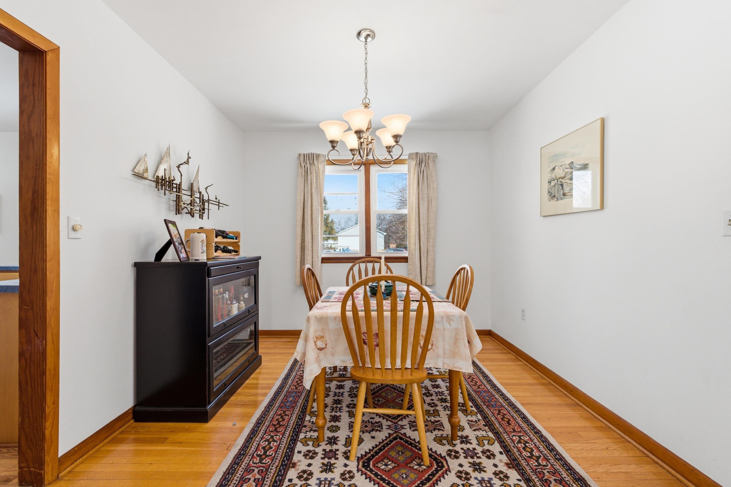 405 North River Road Bridgewater, VA 22812 - Photo 8 of 55 a view of a room with furniture wooden floor and a chandelier