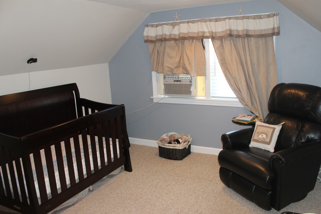 67 Colasanti Road Weymouth, MA 02191 - Photo 11 of 16 a living room with furniture and a window