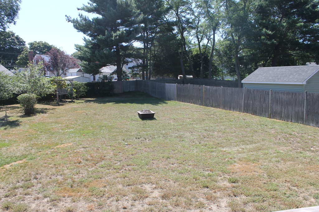 67 Colasanti Road Weymouth, MA 02191 - Photo 14 of 16 a swimming pool with trees in the background