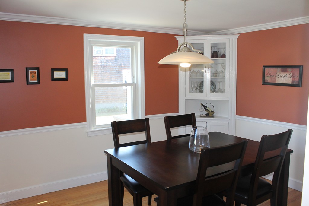 67 Colasanti Road Weymouth, MA 02191 - Photo 4 of 16 a view of a dining room with a table and chairs