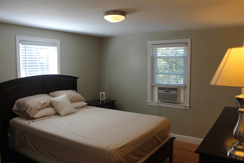 67 Colasanti Road Weymouth, MA 02191 - Photo 6 of 16 a bedroom with a bed and a window