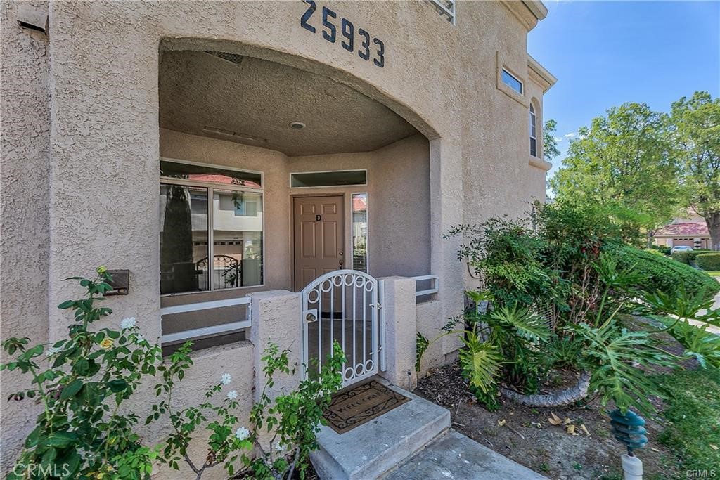 25933 Stafford Canyon Road, Unit D Stevenson Ranch, CA 91381 - Photo 1 of 9 Front entrance porch