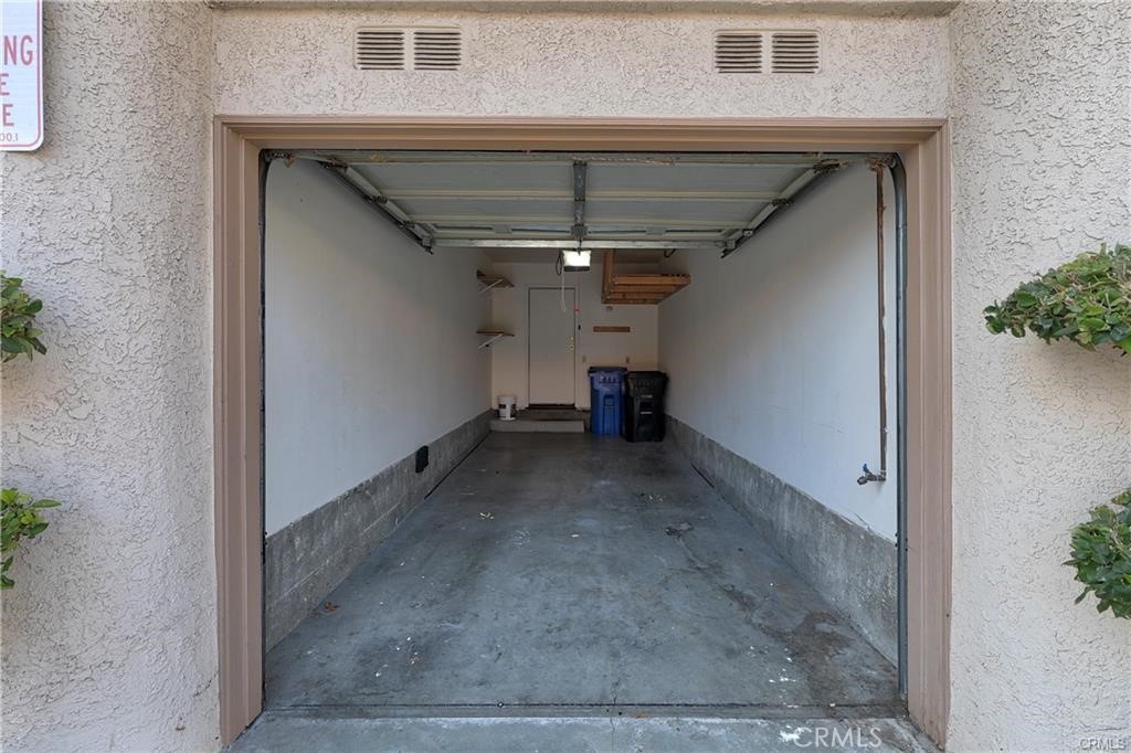 25933 Stafford Canyon Road, Unit D Stevenson Ranch, CA 91381 - Photo 4 of 9 1-car attached garage