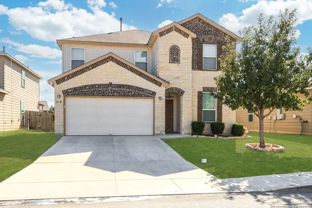 a view of house with garden