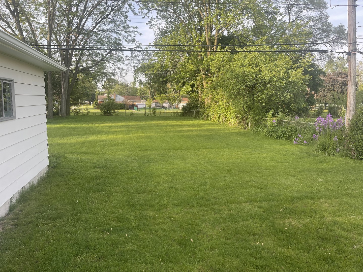 Undisclosed Address Hillside, IL 60162 - Photo 3 of 4 a view of a field of grass and trees