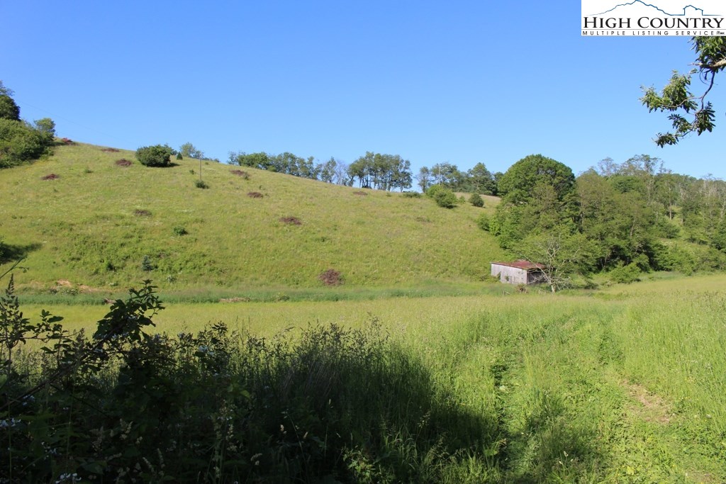 640 Joe Weaver Road Lansing, NC 28643 - Photo 6 of 15 a view of a field with an ocean