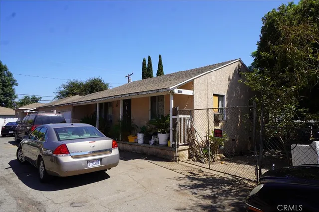 a car parked in front of a house