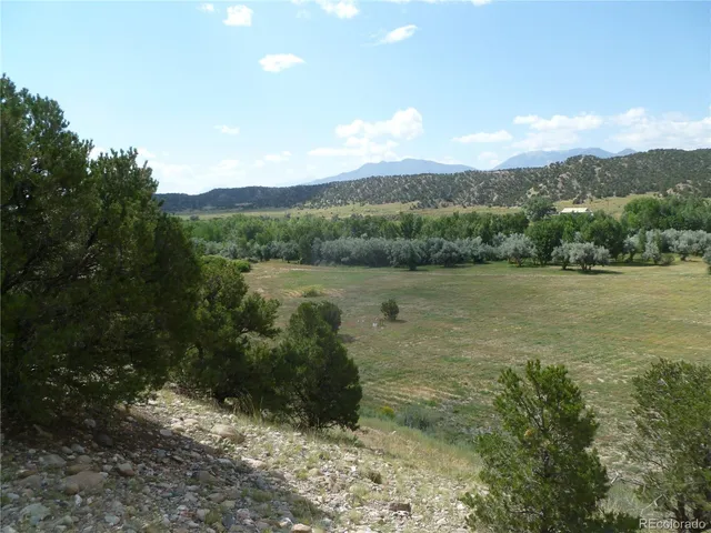 a view of a lake with a mountain in the background