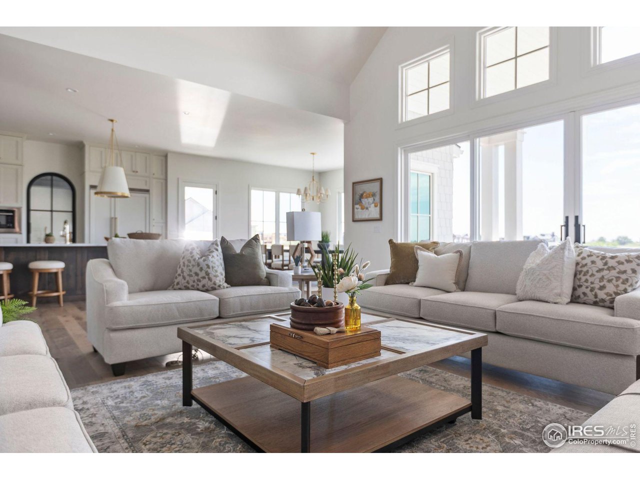 2568 Southwind Road Berthoud, CO 80513 - Photo 17 of 40 a living room with furniture and a large window