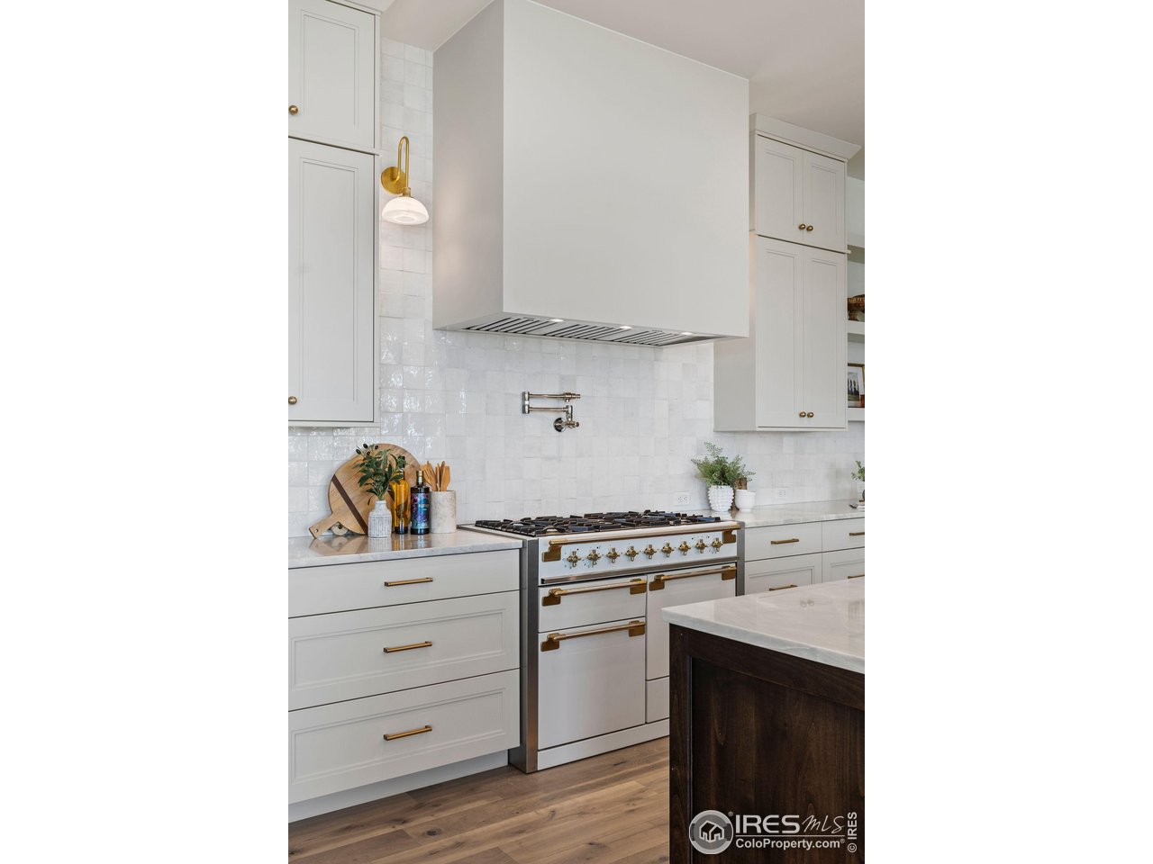 2568 Southwind Road Berthoud, CO 80513 - Photo 40 of 40 a kitchen with stainless steel appliances a stove and cabinets