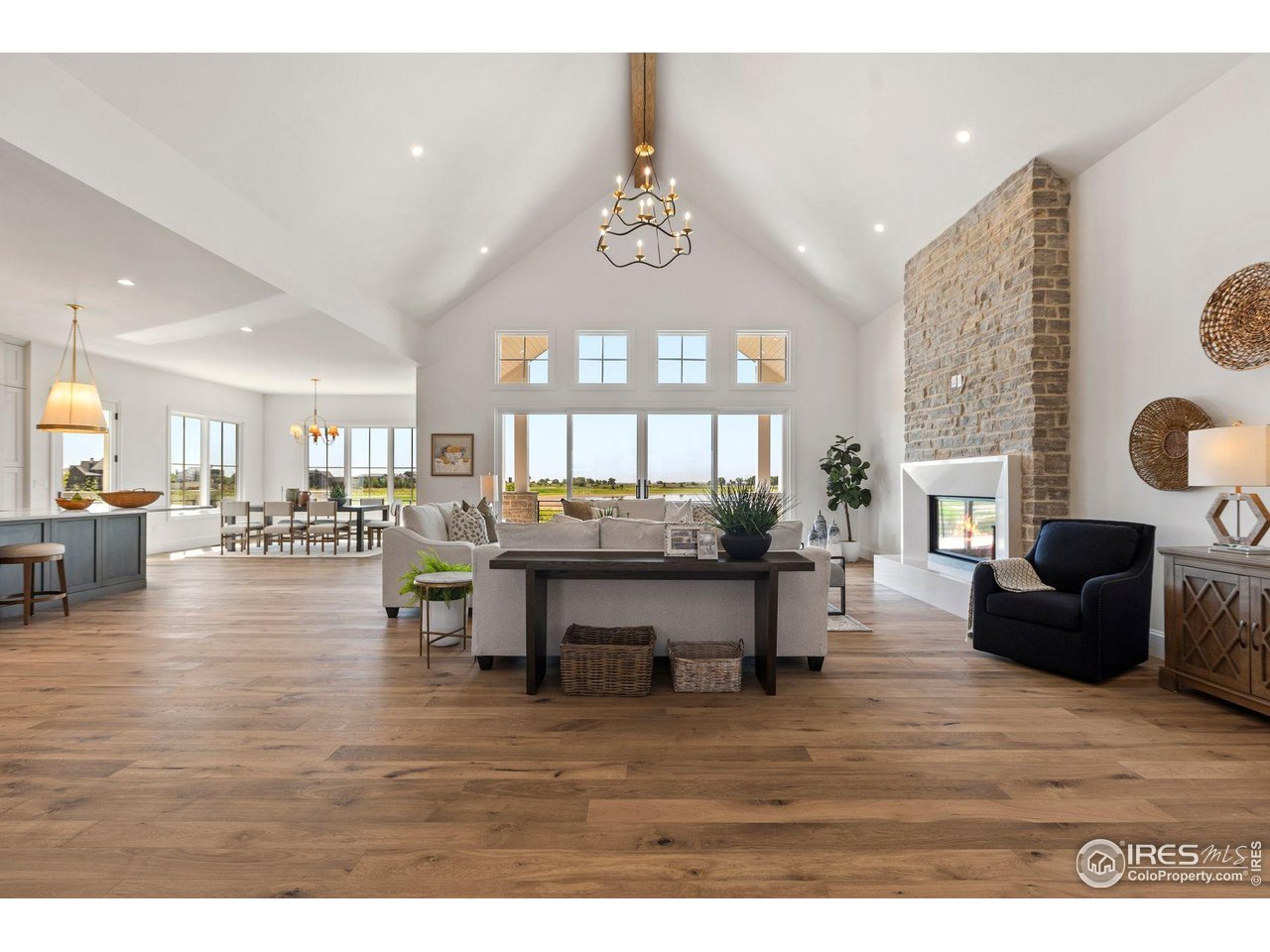 2568 Southwind Road Berthoud, CO 80513 - Photo 4 of 40 a living room with furniture and a wooden floor