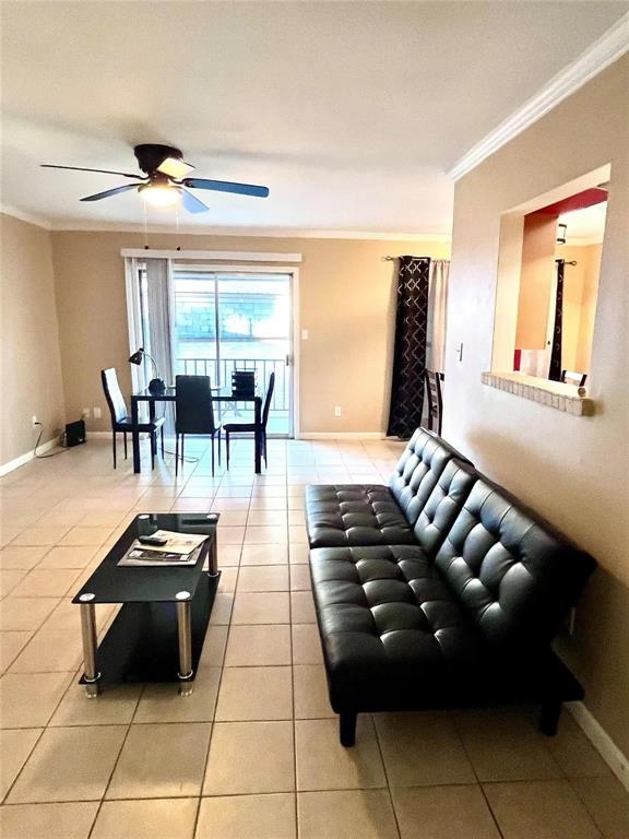7000 Creswell Road, Unit 217 Shreveport, LA 71106 - Photo 12 of 17 a kitchen with a table chairs and a stove