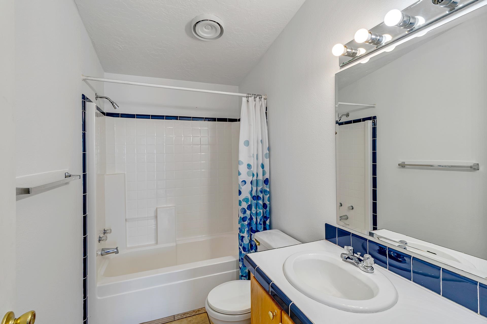 1940 10 Road Mack, CO 81525 - Photo 21 of 42 a bathroom with a sink toilet and shower
