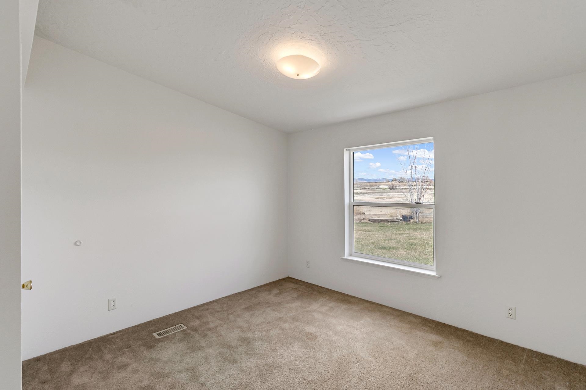 1940 10 Road Mack, CO 81525 - Photo 22 of 42 an empty room with windows