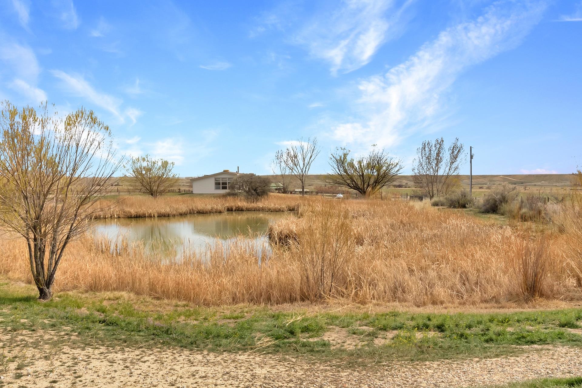 1940 10 Road Mack, CO 81525 - Photo 40 of 42 a view of a lake next to a yard