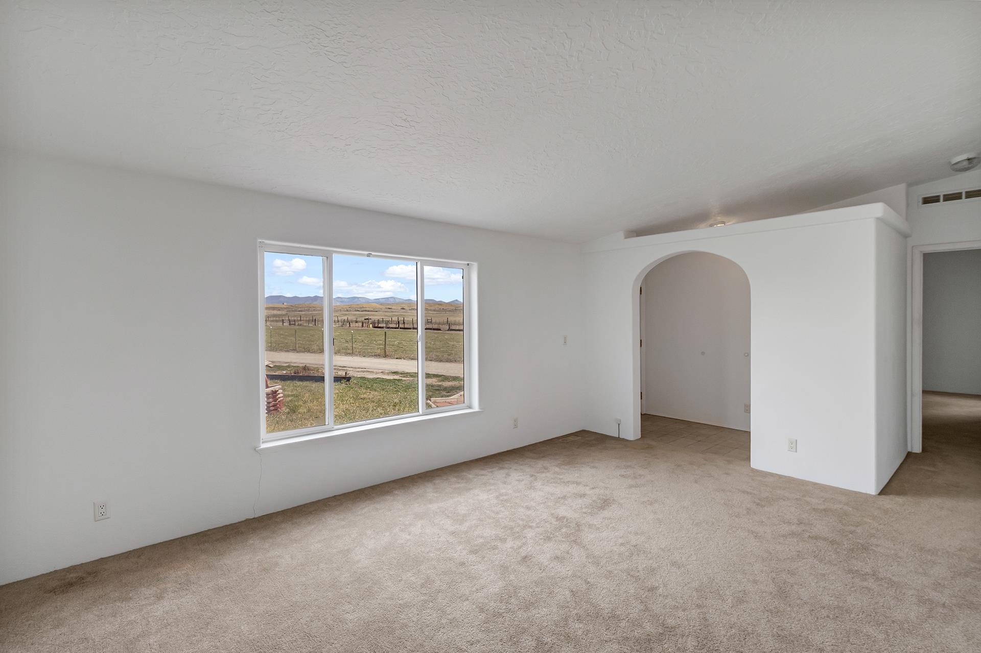 1940 10 Road Mack, CO 81525 - Photo 5 of 42 an empty room with windows