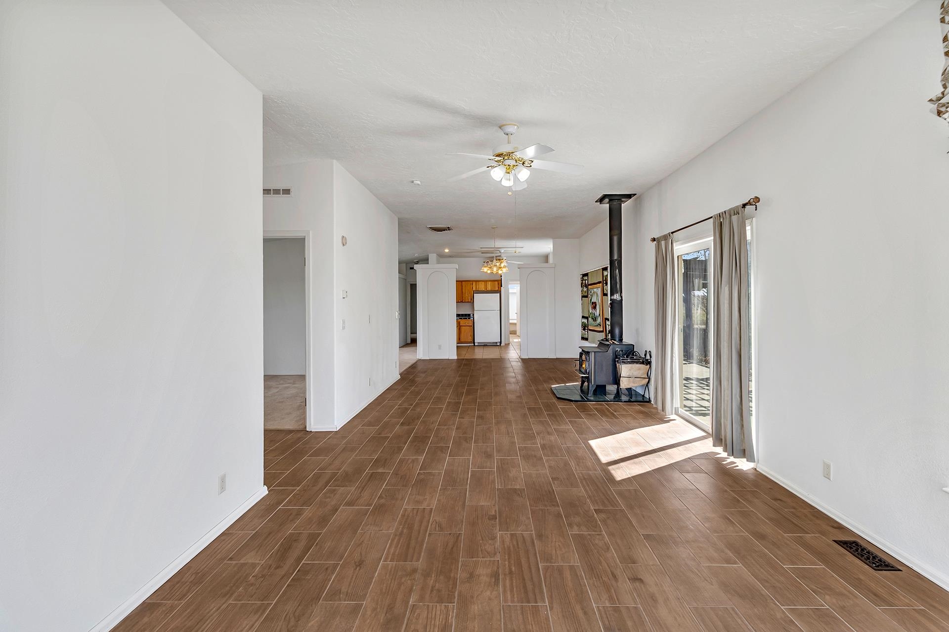 1940 10 Road Mack, CO 81525 - Photo 7 of 42 a view of a hallway with wooden floor and furniture